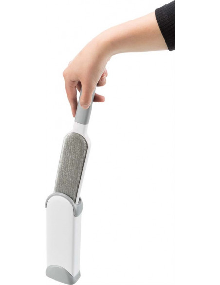 Kläd- och textilborste med rensstation